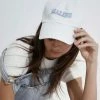 Beige Botany ACCESSORIES Malibu Embroidered Off White Cap 2 Beige Botany ACCESSORIES Malibu Embroidered Off White Cap